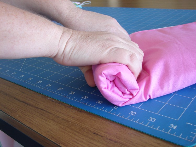 roll mat to the top where elastic is to secure